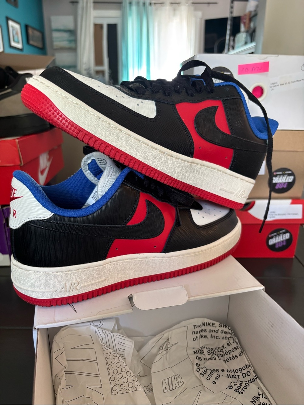 Nike Low-Top Sneakers in Black, Red, Blue and White
